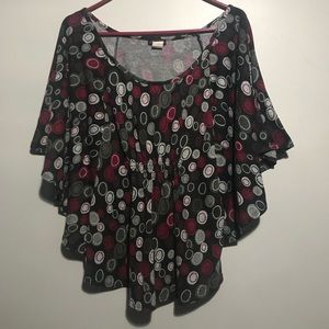 Tunic with bat wing arms